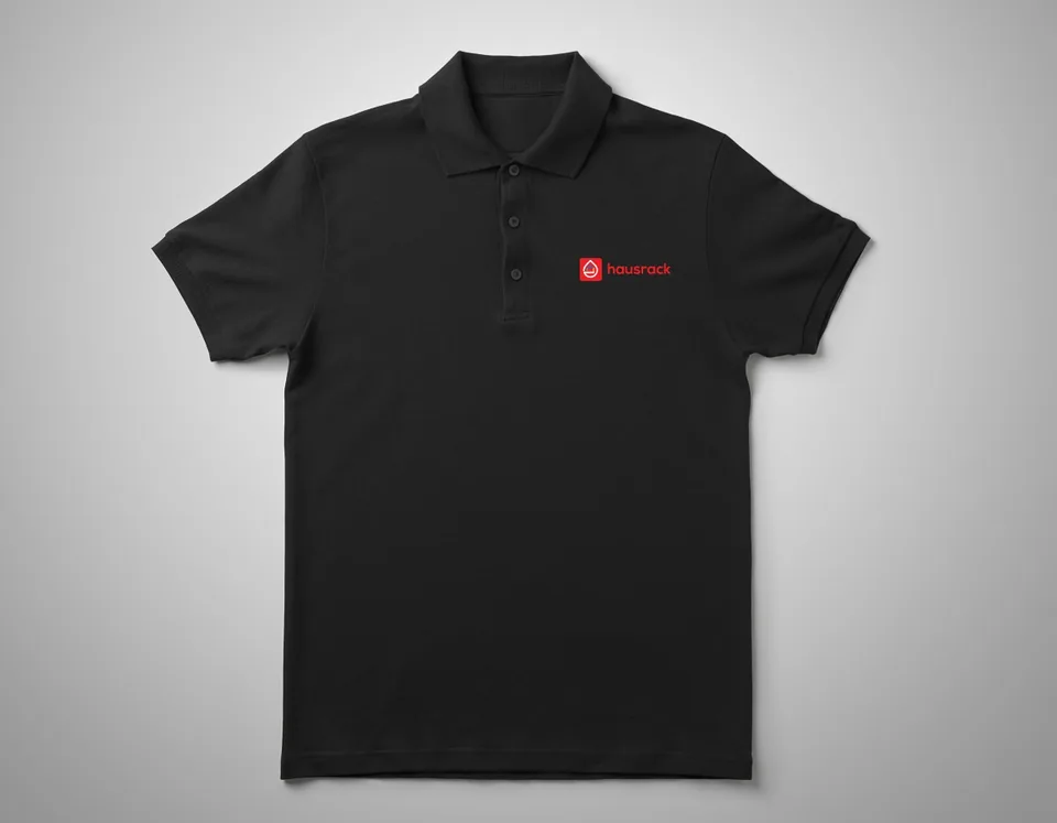 Hausrack: polo, front — custom printed by Press My Crew